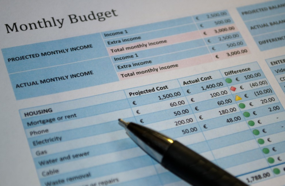 Laptop display of a monthly budget planner